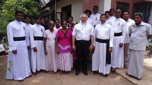 Visite aux familles des Scolastiques